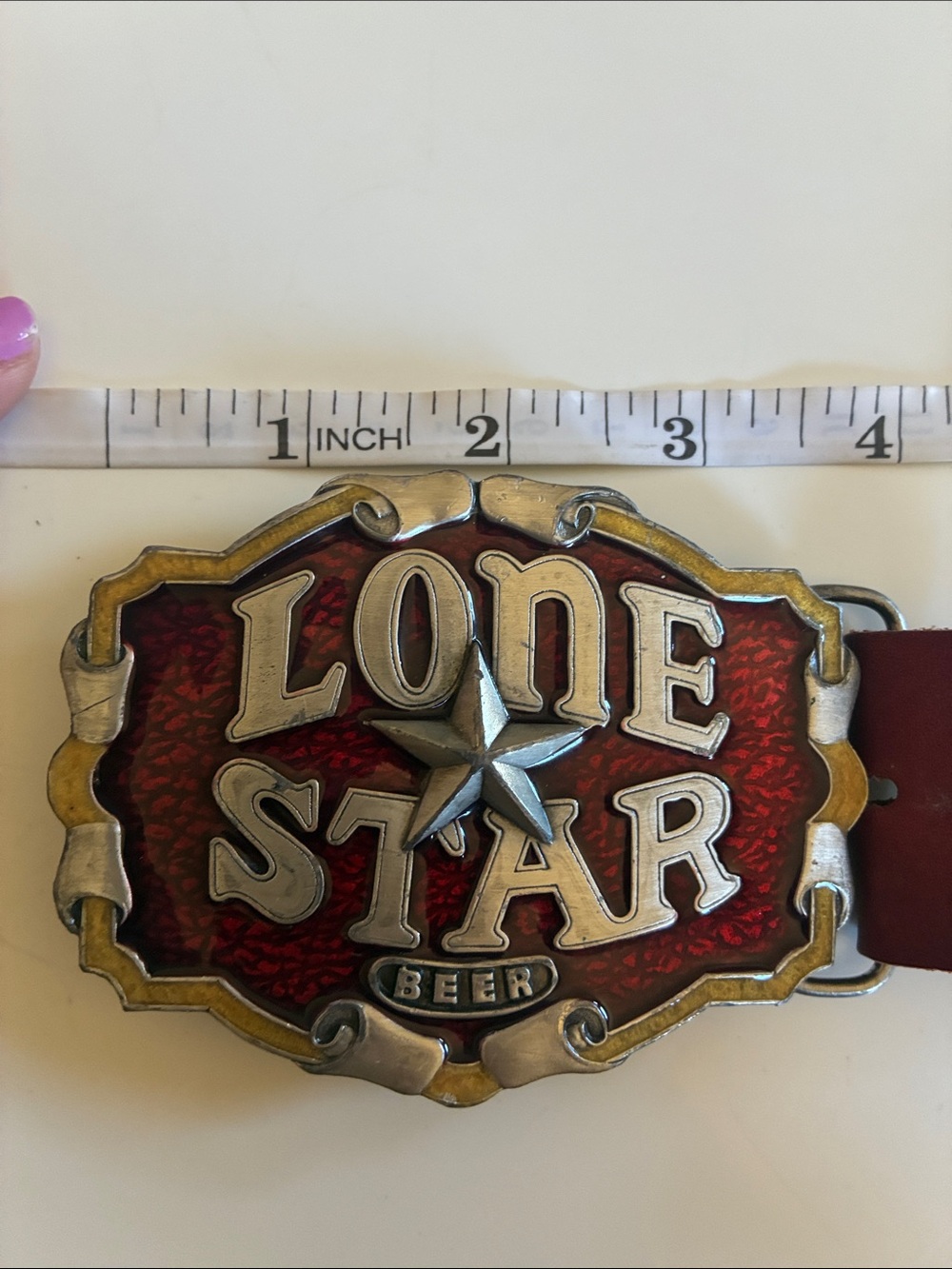 Vintage Lone Star Beer Belt Buckle with beer opener on red leather belt